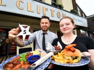 Manager Ryan Underhill and staff member Isabel Jones from The Clifton pub, Sedgley, celebrate receiving five stars for it's hygiene level