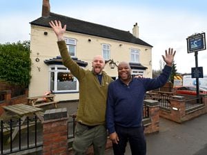 New licensee Oliver Kendall and area manager Daniel Richards celebrate that The Swan pub, Brownhills, will be opening within the next few days