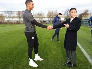 Jake Livermore and Guochuan Lai Owner / Controlling Shareholder of West Bromwich Albion (Photo by Adam Fradgley/West Bromwich Albion FC via Getty Images).