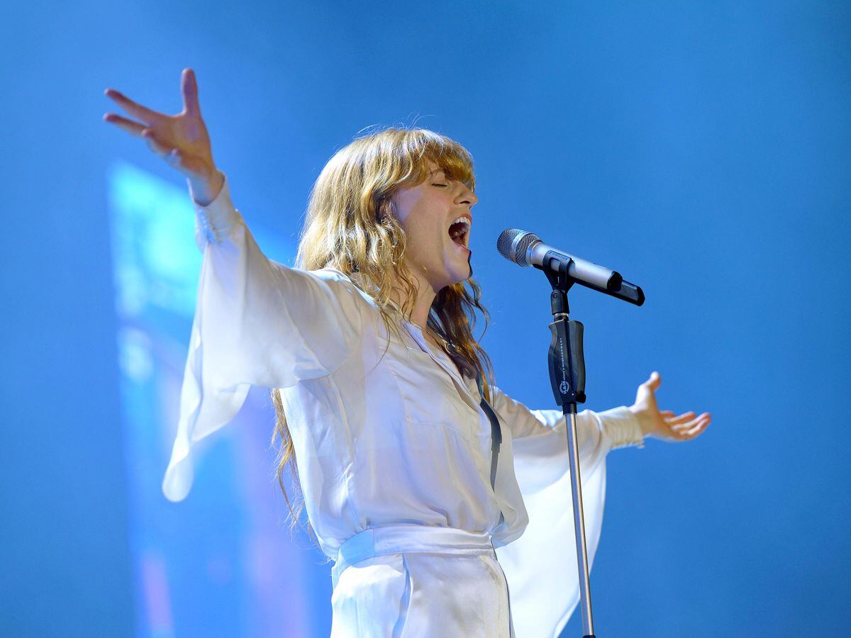 Florence performing with the band Florence and the Machine