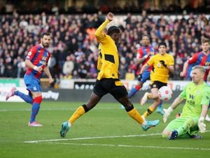 Chiquinho of Wolverhampton Wanderers has a shot saved by Vicente Guaita of Crystal Palace during the Premier League match between Wolverhampton Wanderers and Crystal Palace at Molineux on March 05, 2022 in Wolverhampton, England. (Photo by Jack Thomas - WWFC/Wolves via Getty Images).