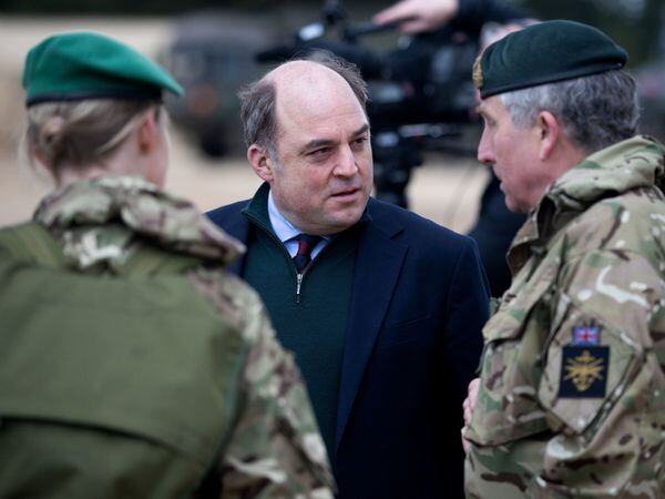 Defence Secretary Ben Wallace speaks with members of the armed forces
