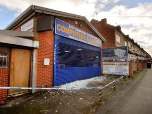 Two more men have been charged by police following the shooting at City Computers in Smethwick