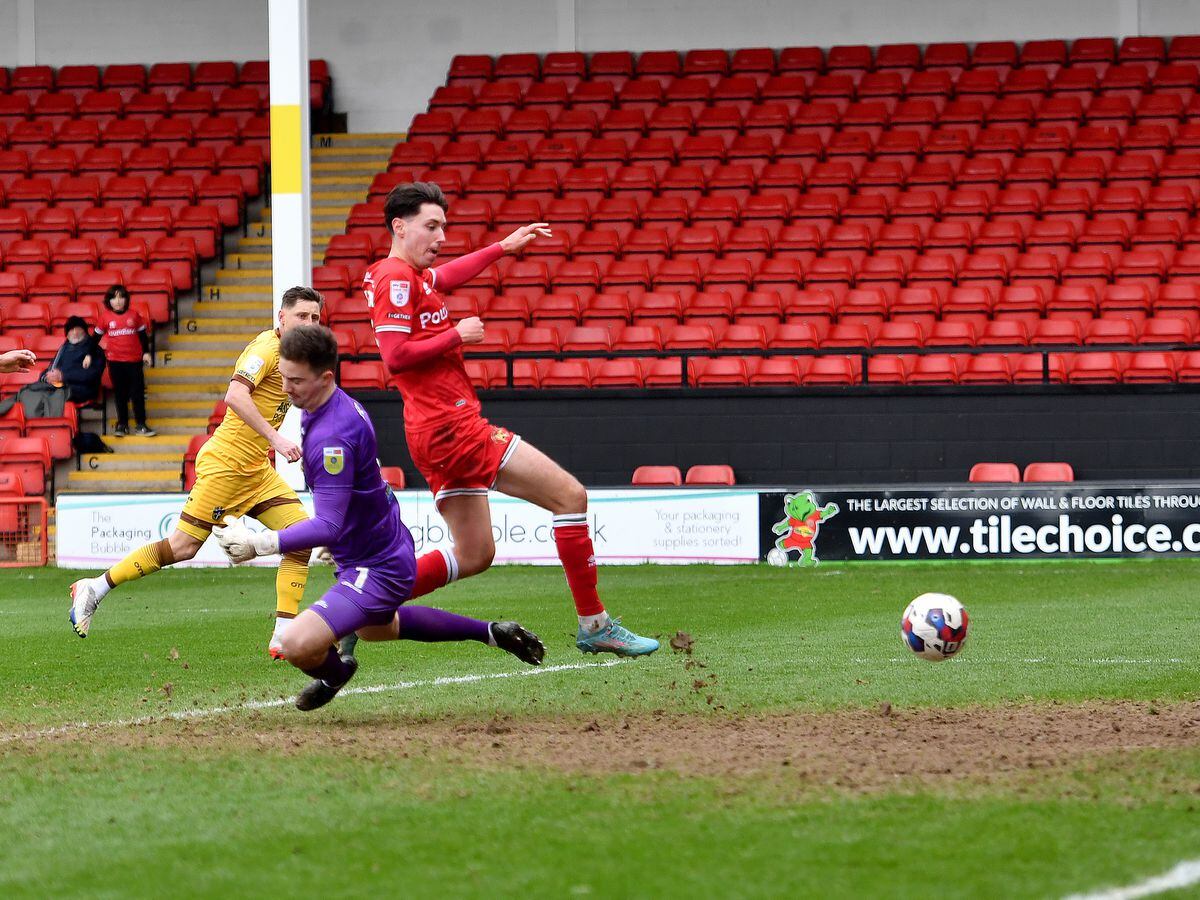 Isaac Hutchinson scores the equaliser in the last few seconds of the match..