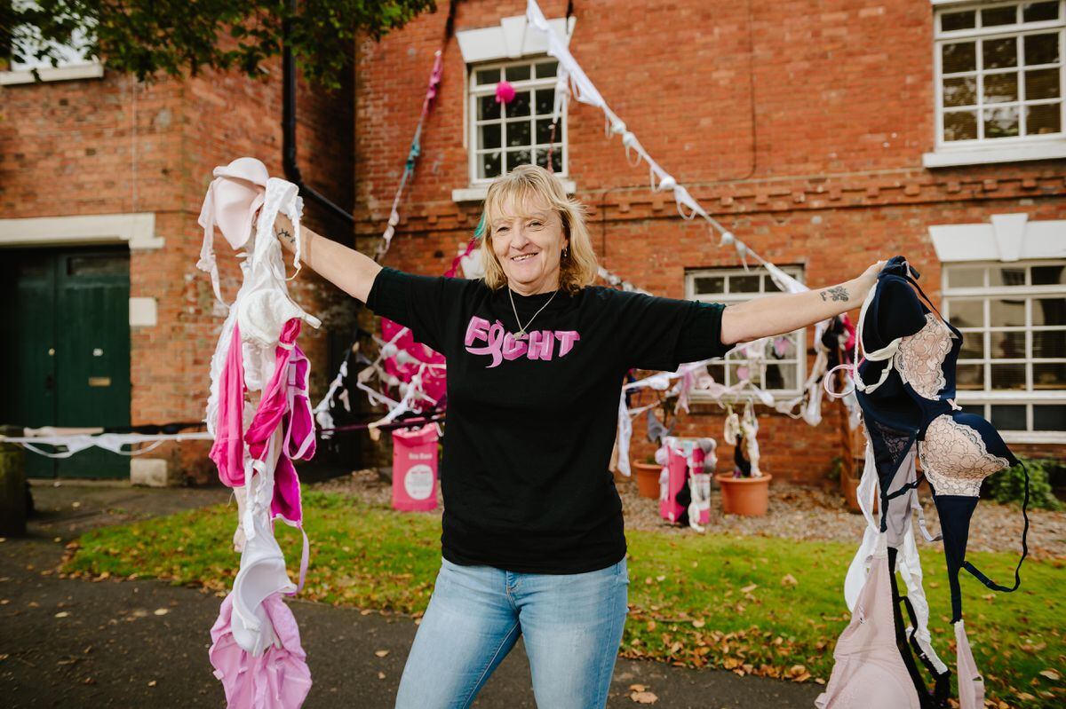 Diane Podmore from Albrighton raises money/awareness for Breast Cancer every October. She has decorated her town house with around 300 bras