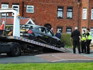 The car is removed from the scene in Freeman Road, Wednesbury