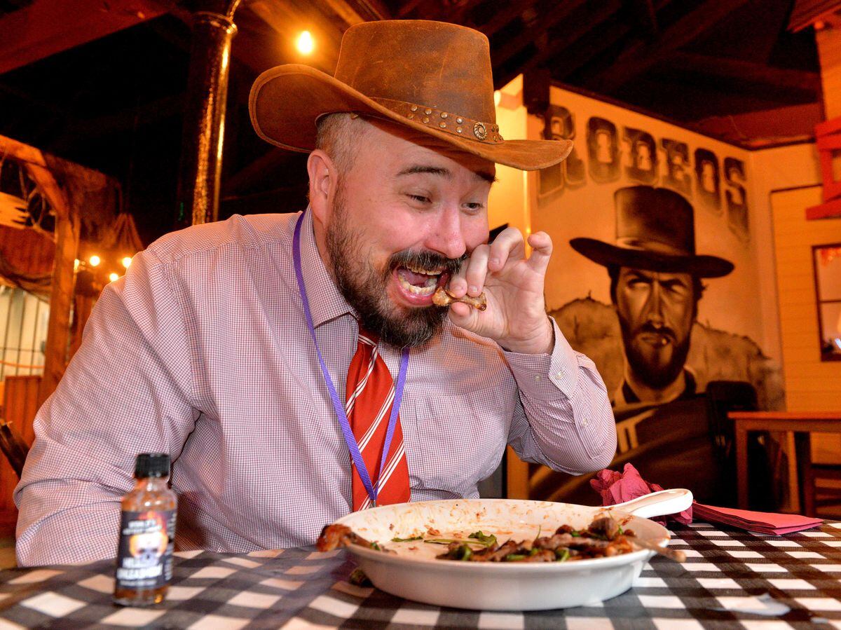 James Vukmirovic takes on the Seven Deadly Wings challenge at Rodeos in Wolverhampton