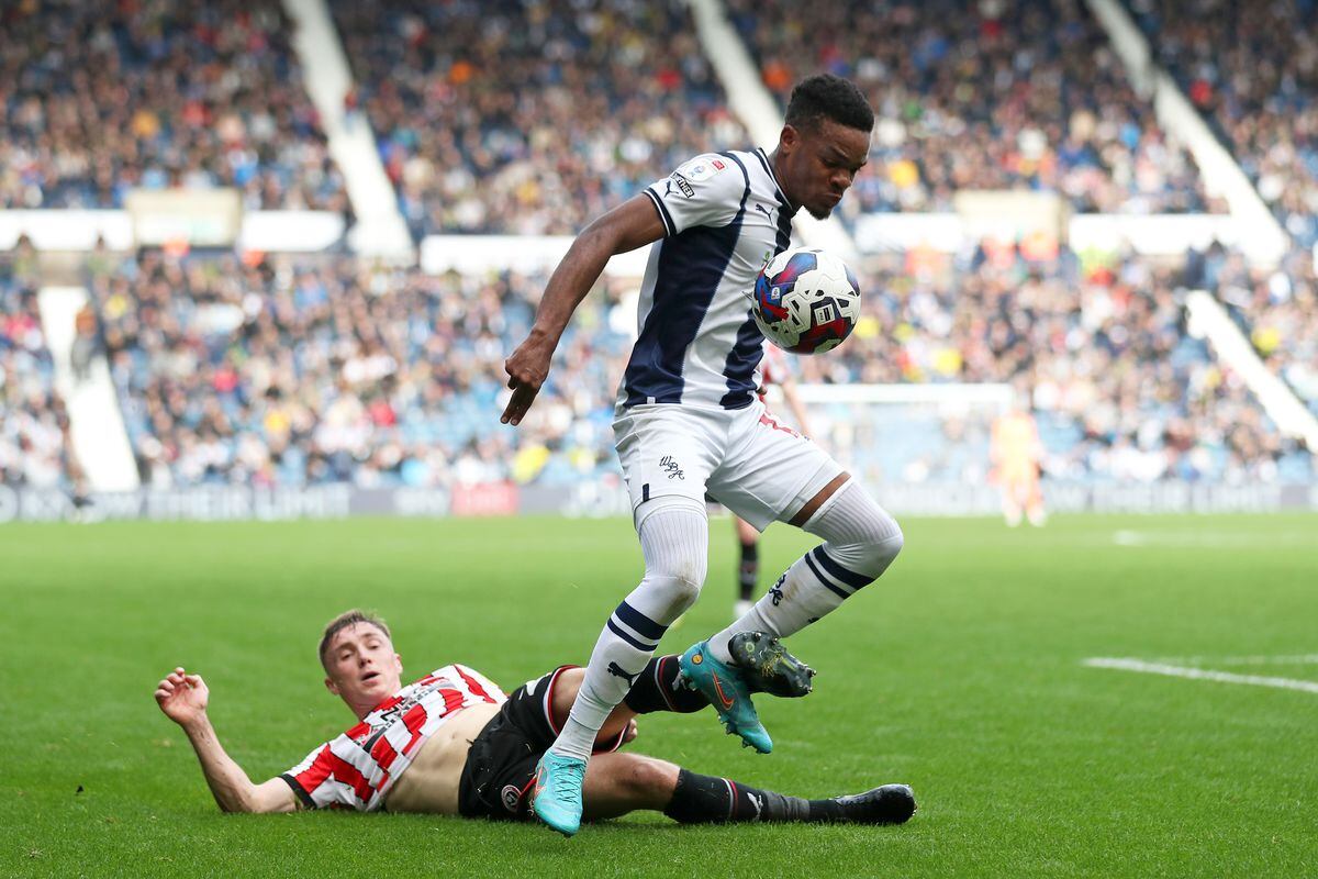 Grady Diangana of West Bromwich Albion and Ben Osborn of Sheffield United during the Sky Bet Championship between West Bromwich Albion and Sheffield United at The Hawthorns on October 29, 2022 in West Bromwich, United Kingdom. (Photo by Adam Fradgley/West Bromwich Albion FC via Getty Images).