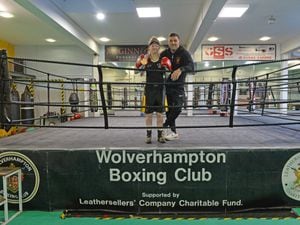 WOLVERHAMPTON COPYRIGHT TIM STURGESS EXPRESS AND  STAR 12/12/2022 Lucy Caldicott, 19, won WInter Box Cup elite in Wigan, has been boxing for 9 years, hopes to turn pro. Pictured at the Wolverhampton boxing club with her dad and coach Lee..