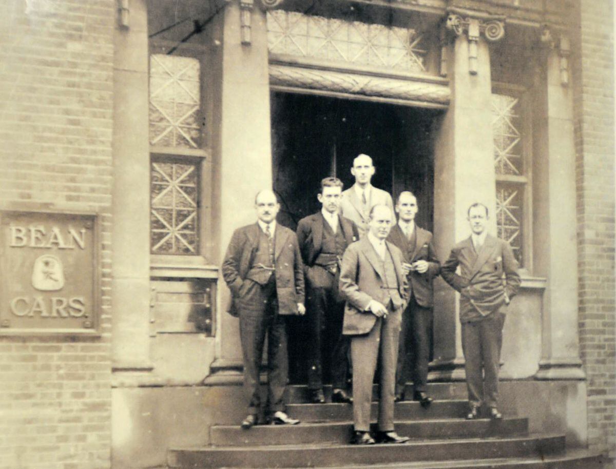 Bean Cars office staff pictured on the steps of Bean House, Dudley, in the 1920s