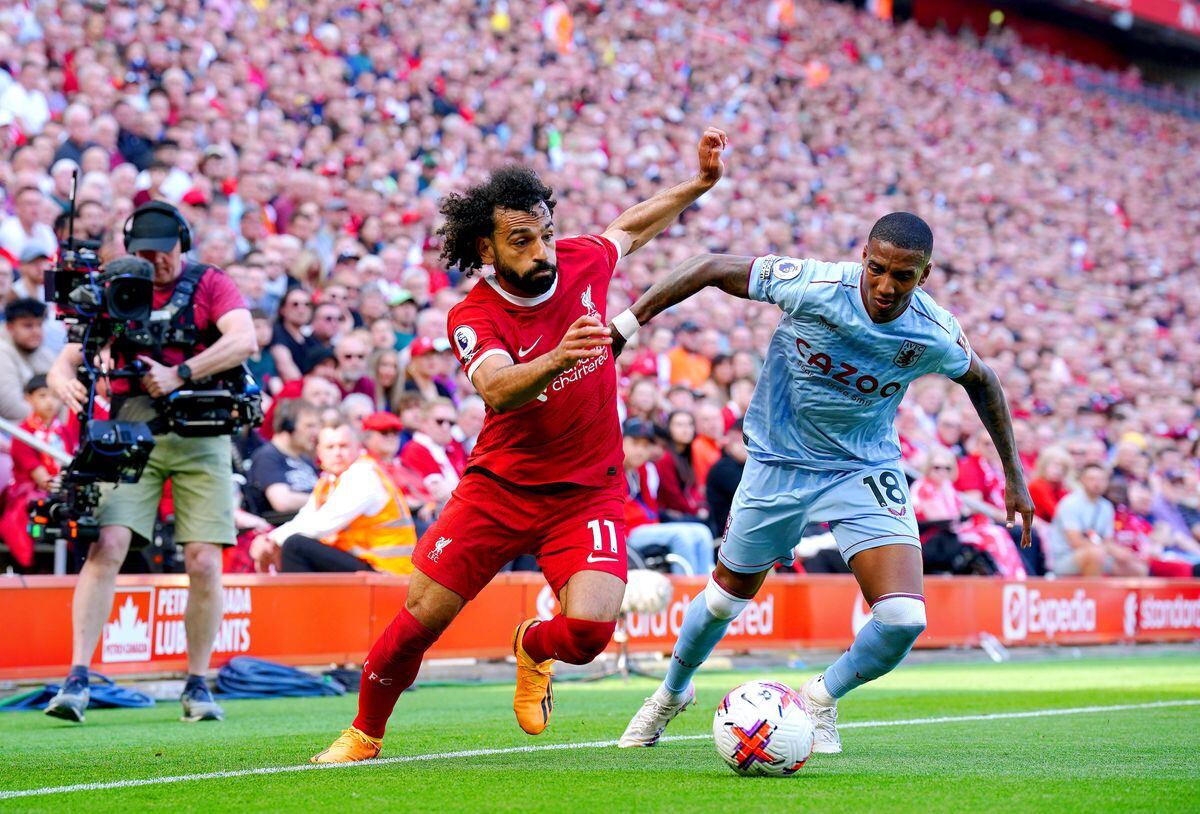 
              
Liverpool's Mohamed Salah (left) and Aston Villa's Ashley Young battle for the ball during the Premier League match at Anfield, Liverpool. Picture date: Saturday May 20, 2023. PA Photo. See PA Story SOCCER Liverpool. Photo credit should read: Peter Byrne/PA Wire.


RESTRICTIONS: EDITORIAL USE ONLY 
No use with unauthorised audio, video, data, fixture lists, club/league logos or "live" services. Online in-match use limited to 120 images, no video emulation. No use in betting, games or single club/league/player publications.
            
