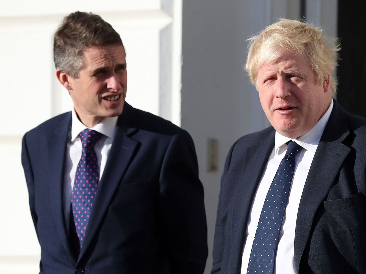 Gavin Williamson, left, is backing his former cabinet colleague Boris Johnson, right