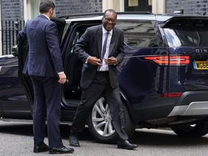 Chancellor Kwasi Kwarteng arrives at 10 Downing Street
