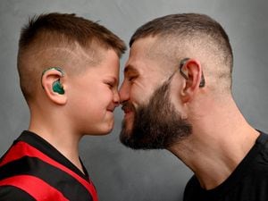 Brad Russell has had a hearing aid tattoo done to match his son Jesse-Harlow