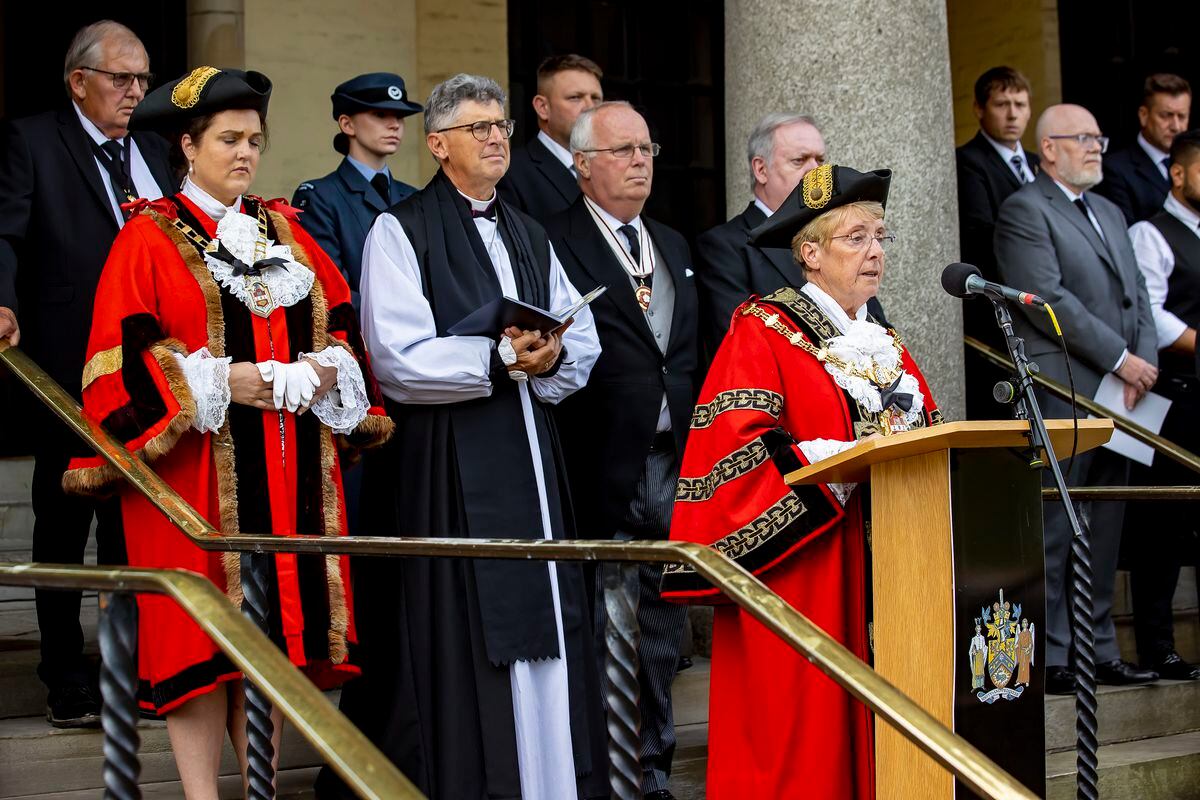 The Mayor of Dudley Councillor Sue Greenaway gives the proclamation in front of councillors and the Bishop of Dudley. Photo: Jonathan Hipkiss