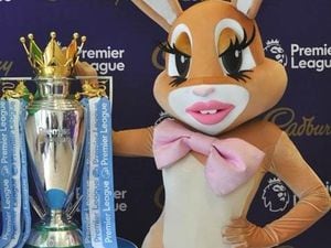 The Cadbury's Bunny with the Premier League Trophy  
