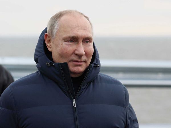 Russian President Vladimir Putin visits the bridge connecting the Russian mainland and the Crimean peninsula