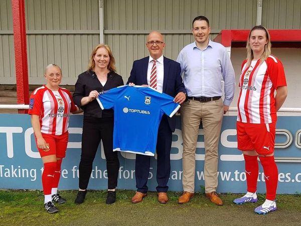 Brendan Wall (fourth from left) with April Pearson-Myatt (second from left) when they recently visited Stourbridge FC to sign a new sponsorship deal.