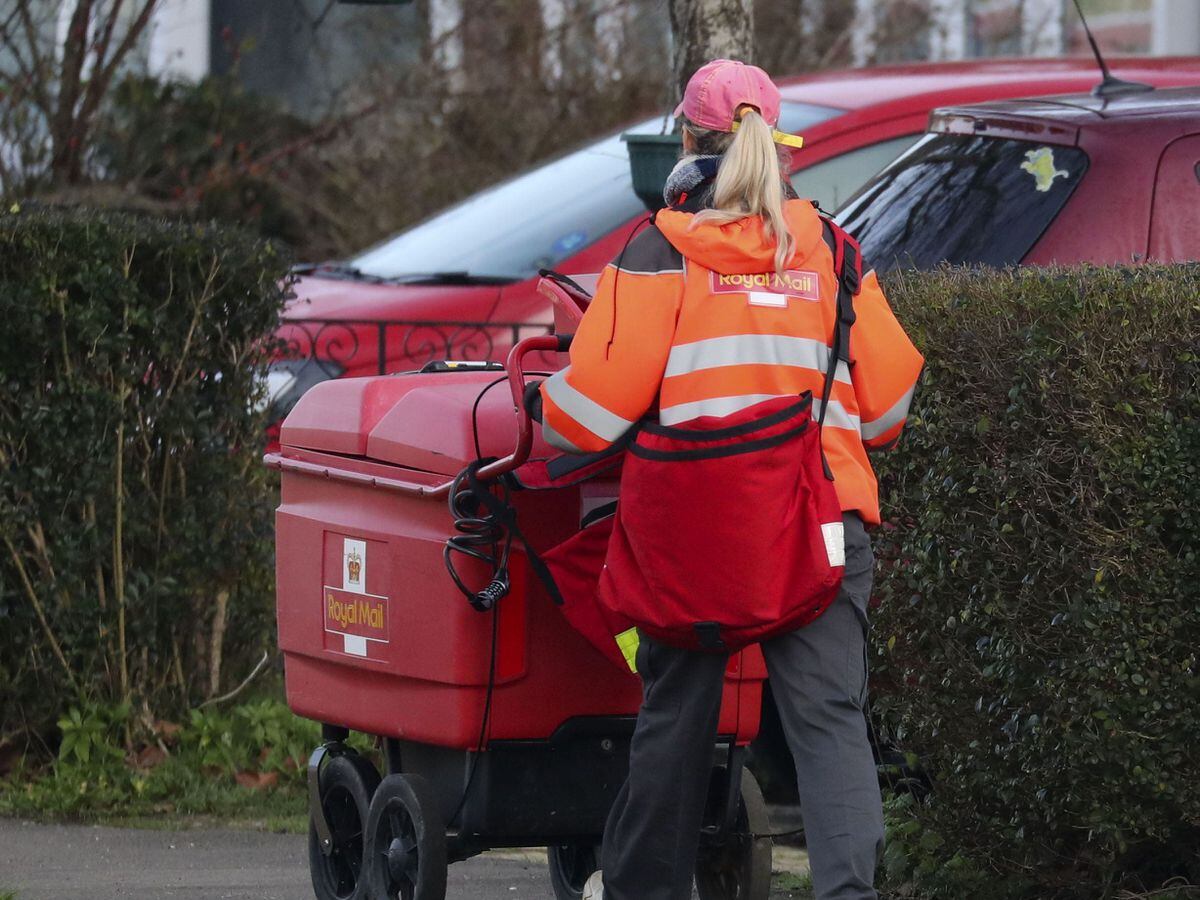 A Royal Mail worker on her rounds