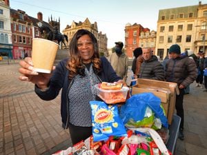 Serving food for people in need of a meal, A Future For All UK founder Maria McKellar, at Queen Square, Wolverhampton