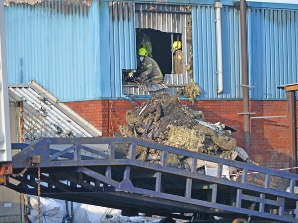 The fire caused a substantial amount of damage to the warehouse and water damage to products at the textiles firm next door