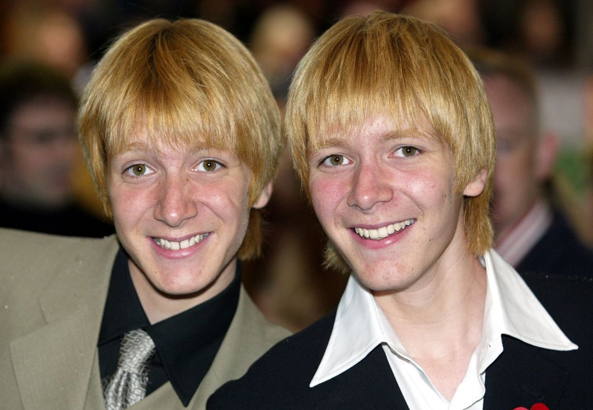 James (L) and Oliver Phelps arrive at London's Odeon Leicester Square for the world premiere of "Harry Potter and the Chamber of Secrets", November 3, 2002. The Phelps twins play Fred and George Weasley in the film, due to go on official release on November 15, 2002, the second screen adaptation from the series of Harry Potter books by British author J K Rowling.  REUTERS/Stephen Hird