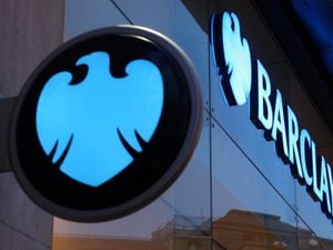 A Barclay's bank sign.