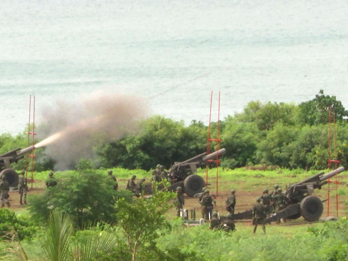 Taiwanese troops conduct a live-fire artillery exercise in Fangshan Township, Pingtung, southern Taiwan, Tuesday, Aug. 9, 2022
