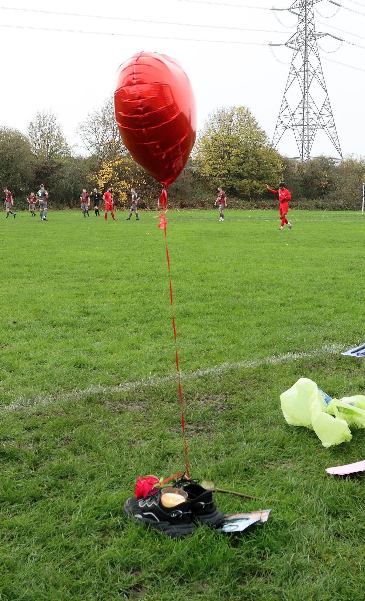 A red balloon was tied to a pair of Liberty's trainers as a tribute during the game