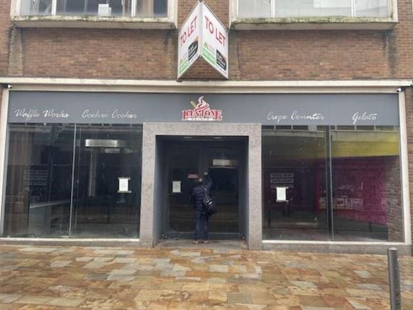 The front of the vacant premises in Queen Street, Wolverhampton, that is set to become a new KFC restaurant and takeaway. Photo: Beamish Consultancy