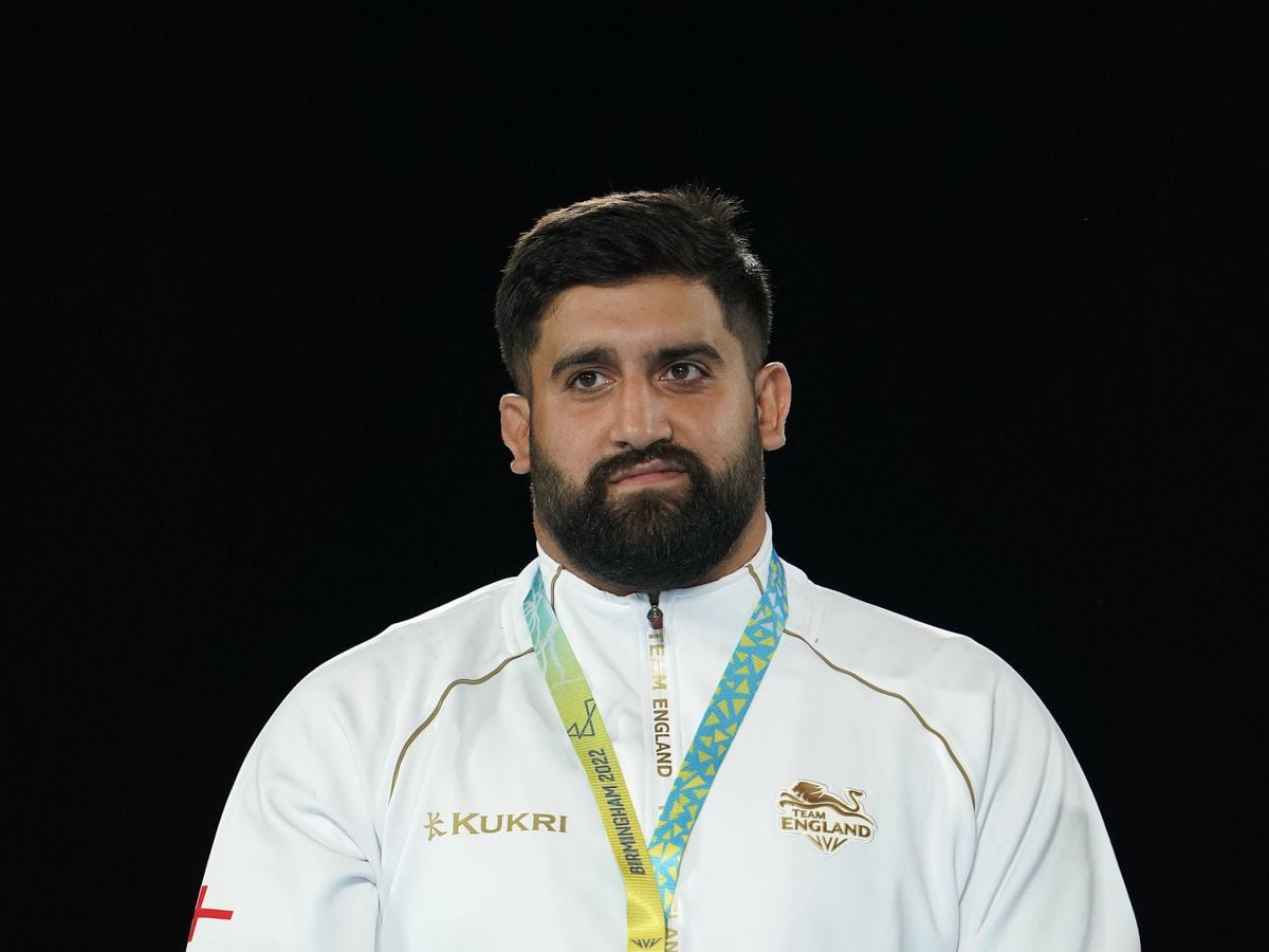 
              
England's Mandhir Kooner poses with his bronze medal after his Men's Freestyle 125kg match against Mauritius' Kensley Anthony Marie at the Coventry Arena on day eight of the 2022 Commonwealth Games. Picture date: Friday August 5, 2022. PA Photo. See PA story COMMONWEALTH Wrestling. Photo credit should read: Zac Goodwin/PA Wire.


RESTRICTIONS: Use subject to 
restrictions. Editorial use only, no commercial use without prior consent from rights holder.
            

