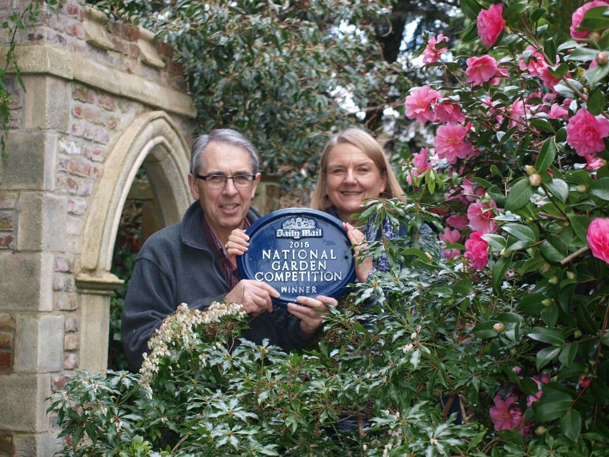 Anne and Brian Bailey in their garden in Compton
