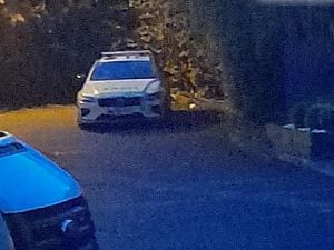 A police car still on the scene on Wednesday night. 