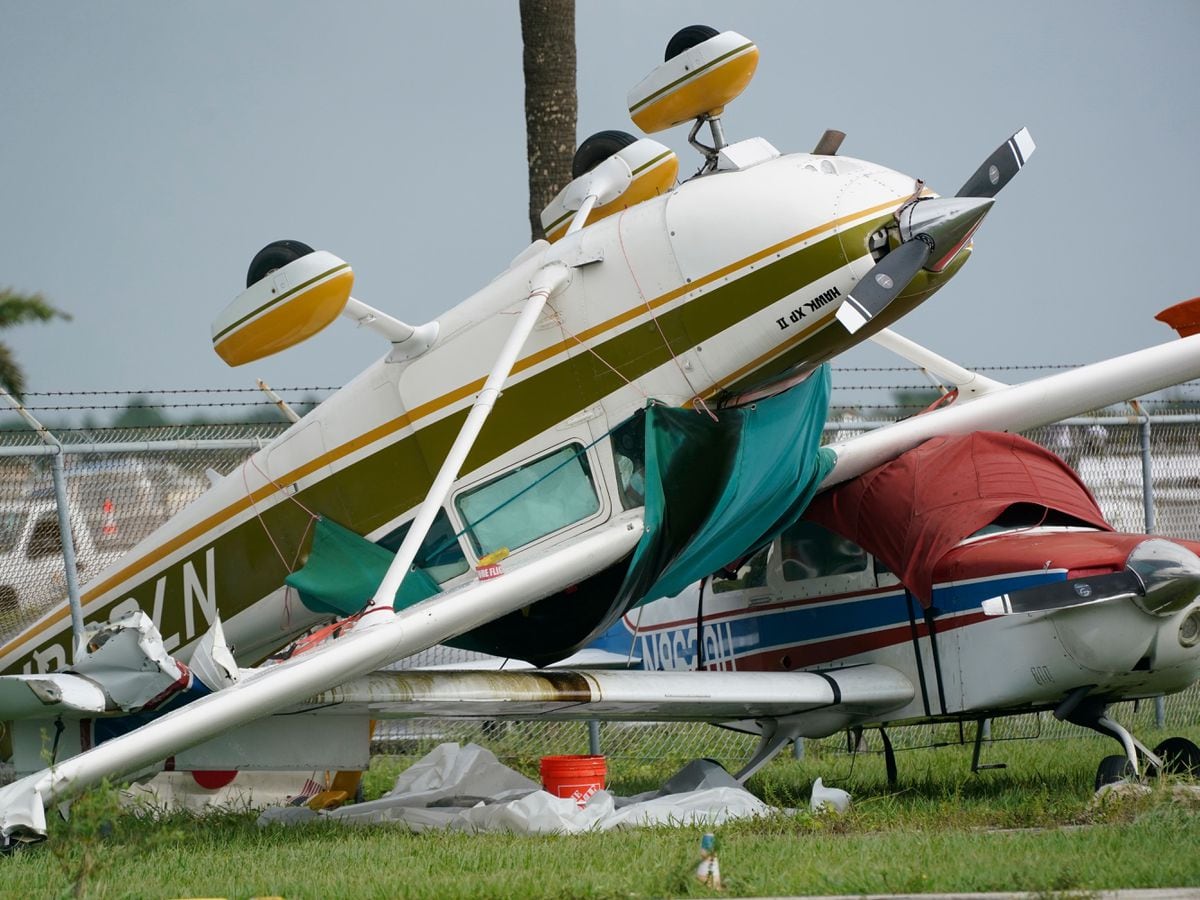 An airplane overturned by a likely tornado produced by the outer bands of Hurricane Ian at North Perry Airport in Pembroke Pines, Florida
