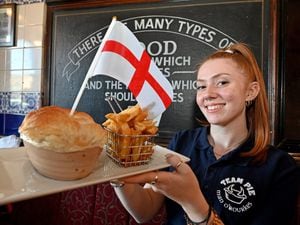 Staff member Holly Daniels with the Full English Pie  at Mad O'Rourke's Pie Factory, Tipton