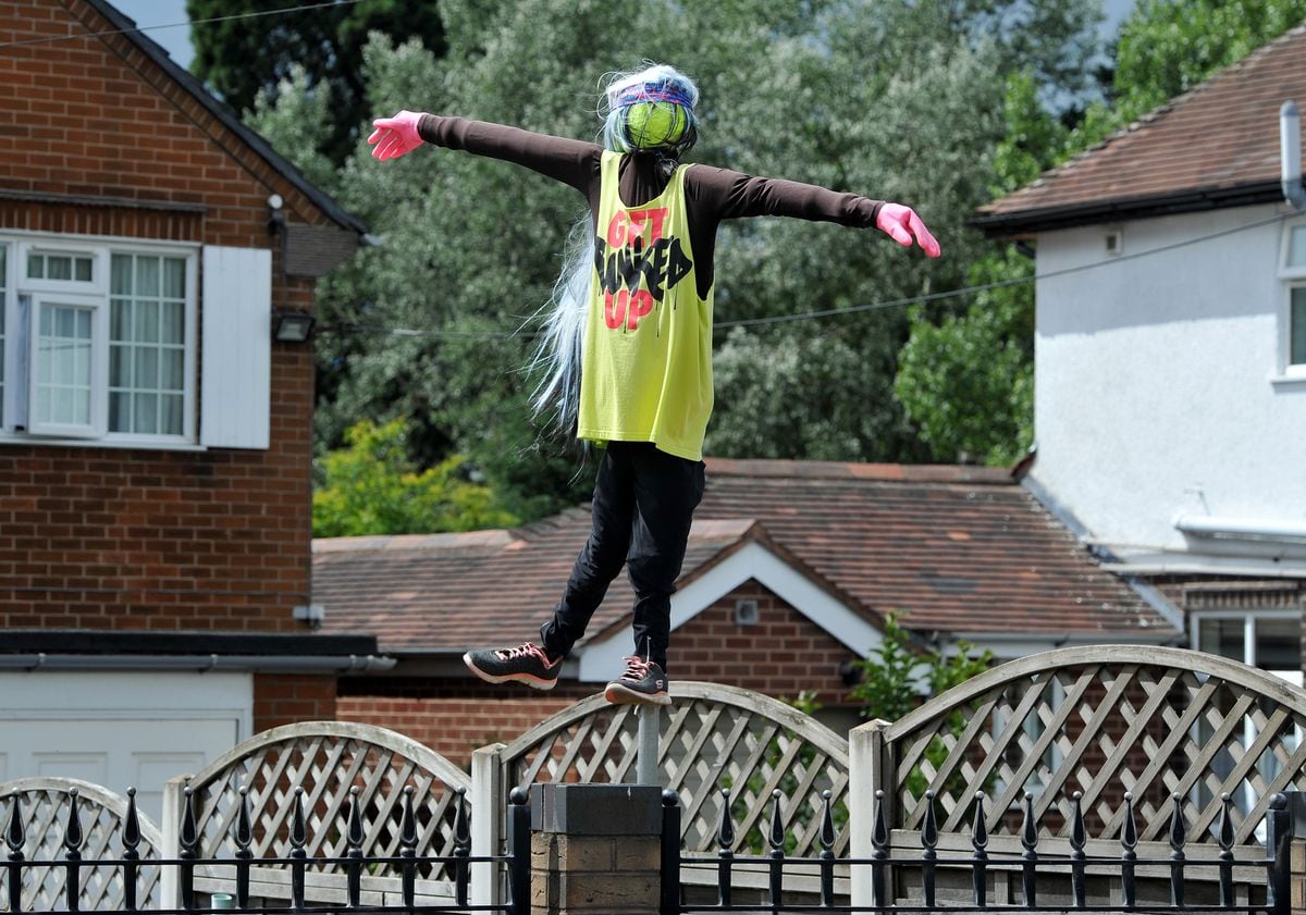 Dozens of scarecrows line the streets of Cresswell, Stafford, for a scarecrow competition