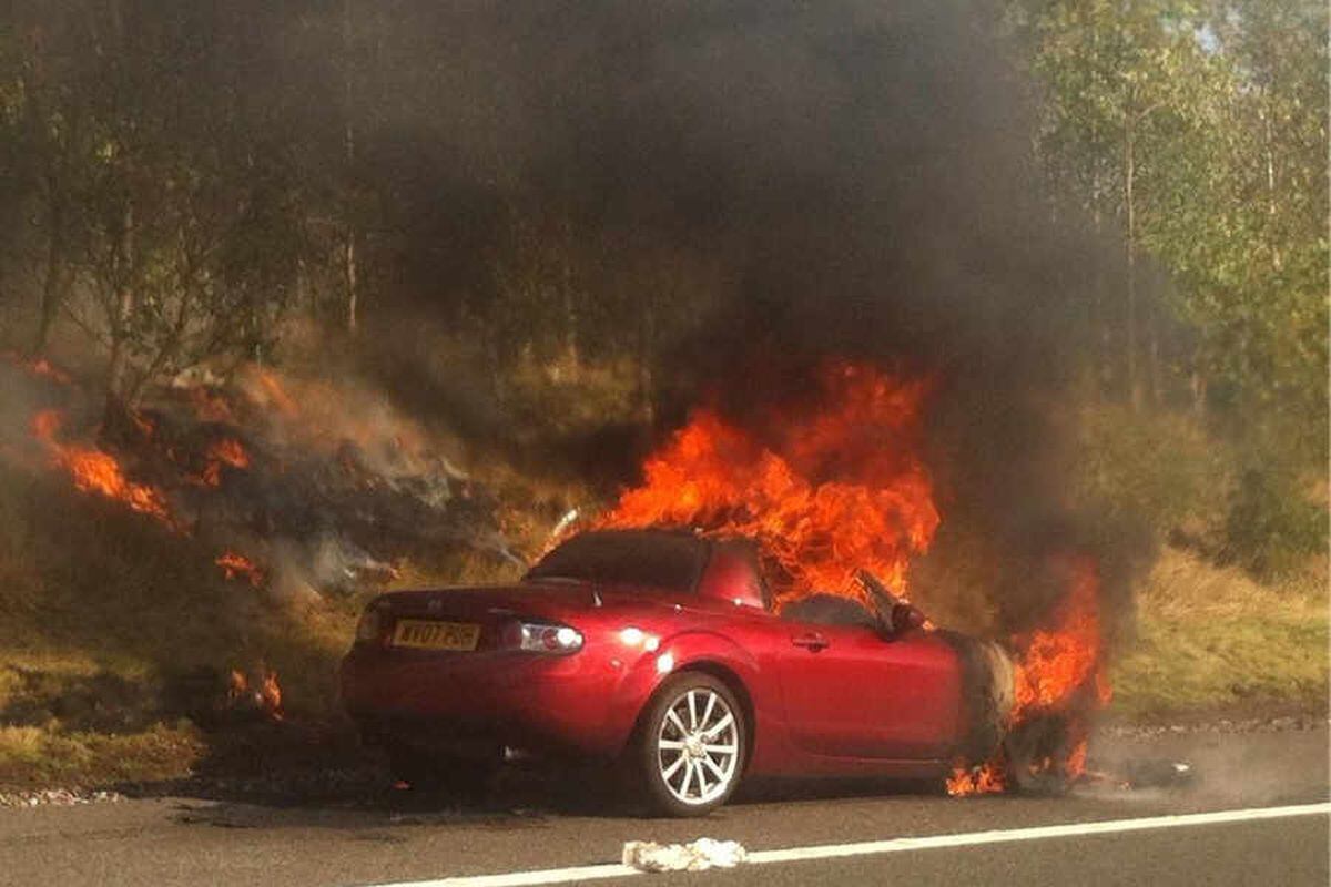 Pictured: Sports car bursts into flames on M6 Toll