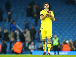 Aston Villa goalkeeper Emiliano Martinez applauds the fans after the final whistle in the Premier League match at the Etihad Stadium, Manchester. Picture date: Sunday February 12, 2023.