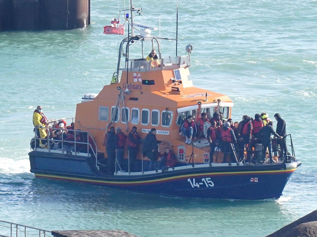 A group of people thought to be migrants are brought into Dover, Kent, onboard the Ramsgate Lifeboat (Gareth Fuller/PA)