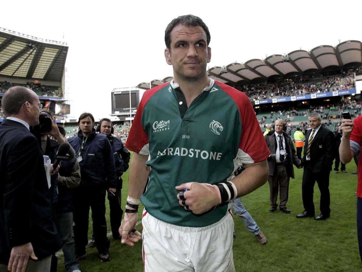 Leicester Tigers’ Martin Johnson walks from the pitch in dejection after their defeat