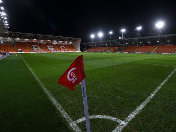 Charlie Brown went onto the pitch at Blackpool's Bloomfield Road ground last December