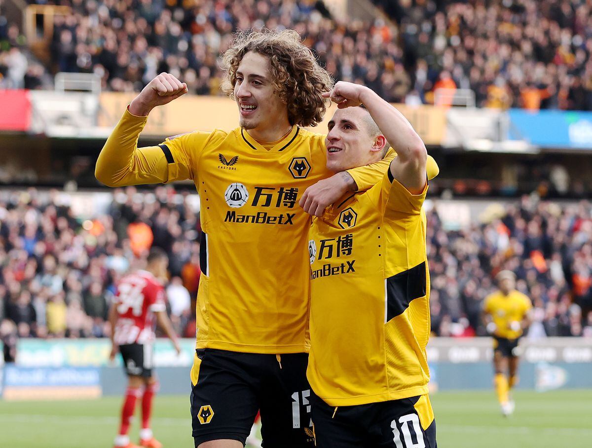 WOLVERHAMPTON, ENGLAND - JANUARY 09: Daniel Podence celebrates after scoring his team's first goal with Fabio Silva of Wolverhampton Wanderers during the Emirates FA Cup Third Round match between Wolverhampton Wanderers and Sheffield United at Molineux on January 09, 2022 in Wolverhampton, England. (Photo by Jack Thomas - WWFC/Wolves via Getty Images).