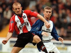 NO WAY THROUGH FOR HUGHES...BLUES' BRYAN HUGHES CANNOT FIND A WAY PASTUTDS MARK PATTERSON DURING BLUES 0-0 DRAWAT BRAMHALL LANE