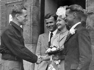 Wilken Ranck and his bride Elsa Andersen being congratulated by one of Wilken's German comrades after their wedding at Stirchley church in August 1947. The person on the right is presumably the best man.