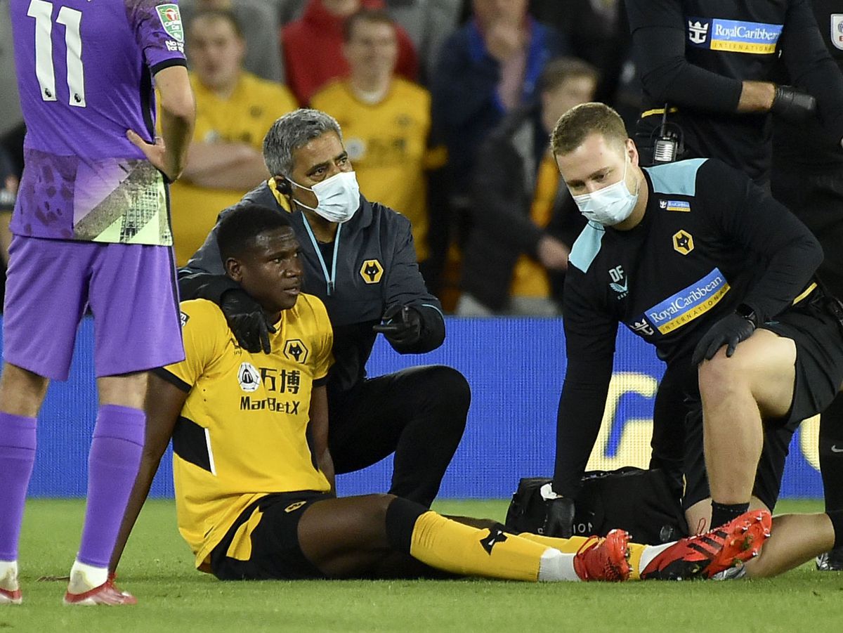 Wolverhampton Wanderers' Yerson Mosquera is assisted after getting injured (PA)
