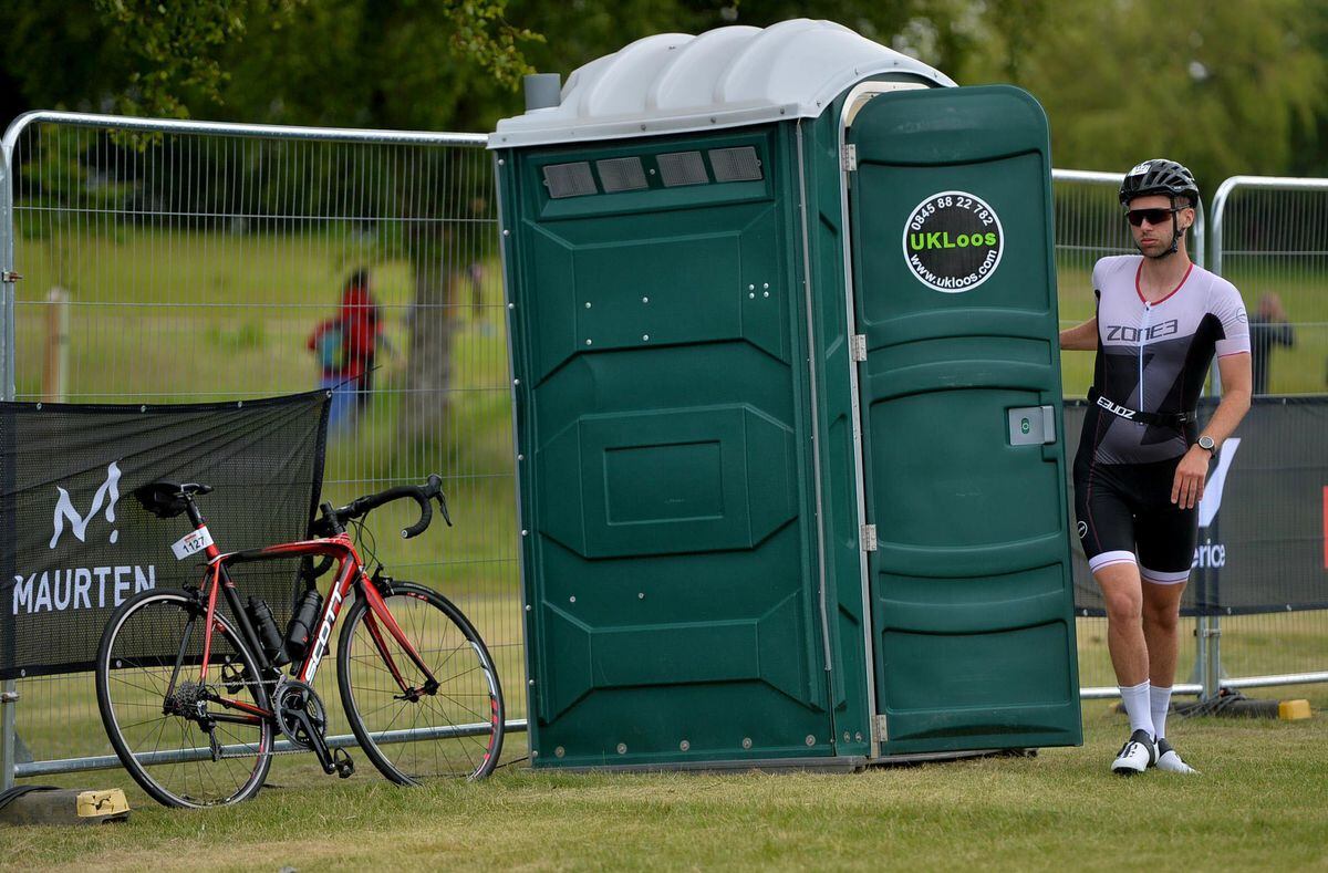Iron bladder: This triathlete held out until he saw a much needed outdoor loo on the course
