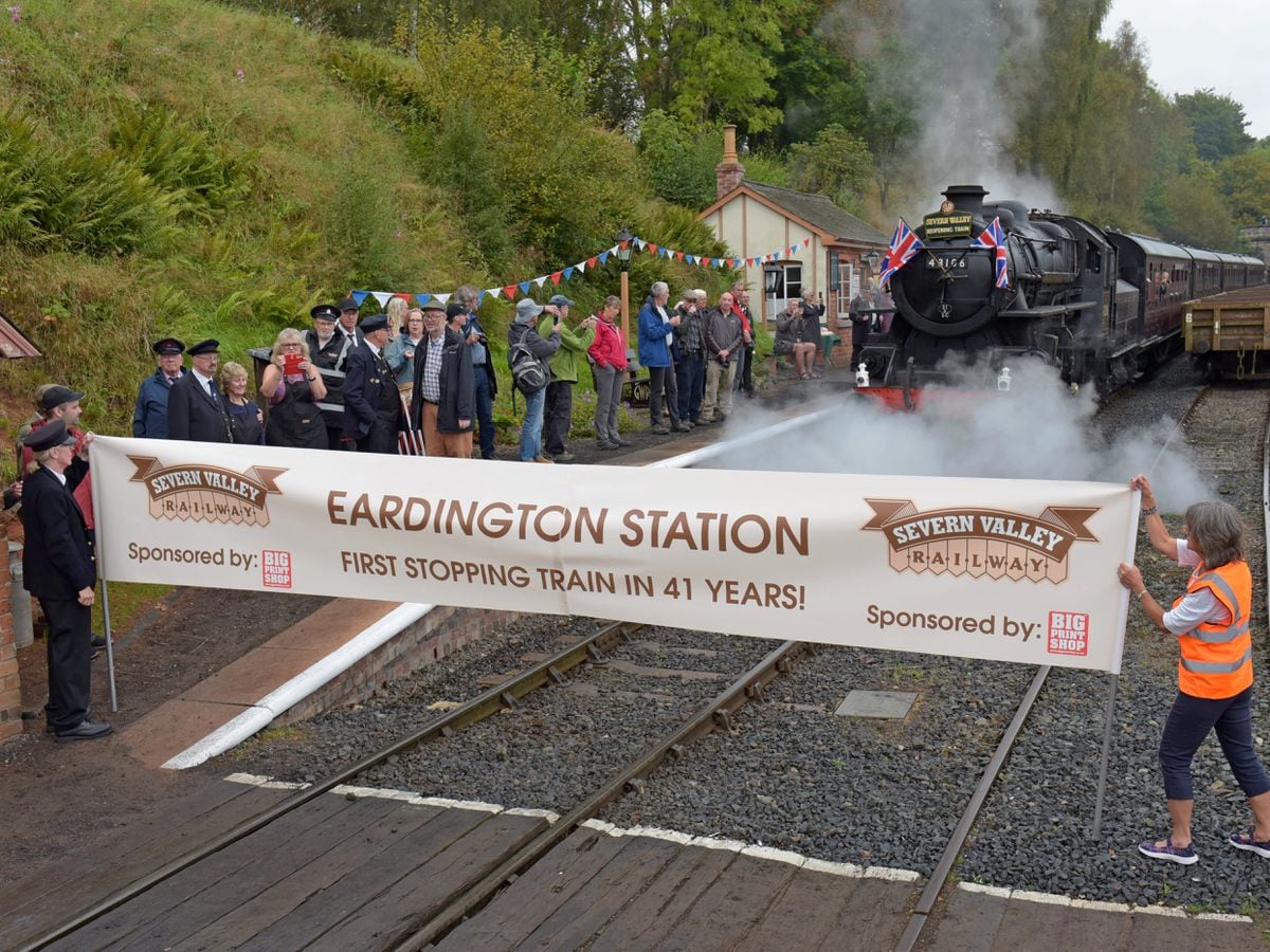 The first timetabled train in 40 years is welcomed as it pulls into Eardington station