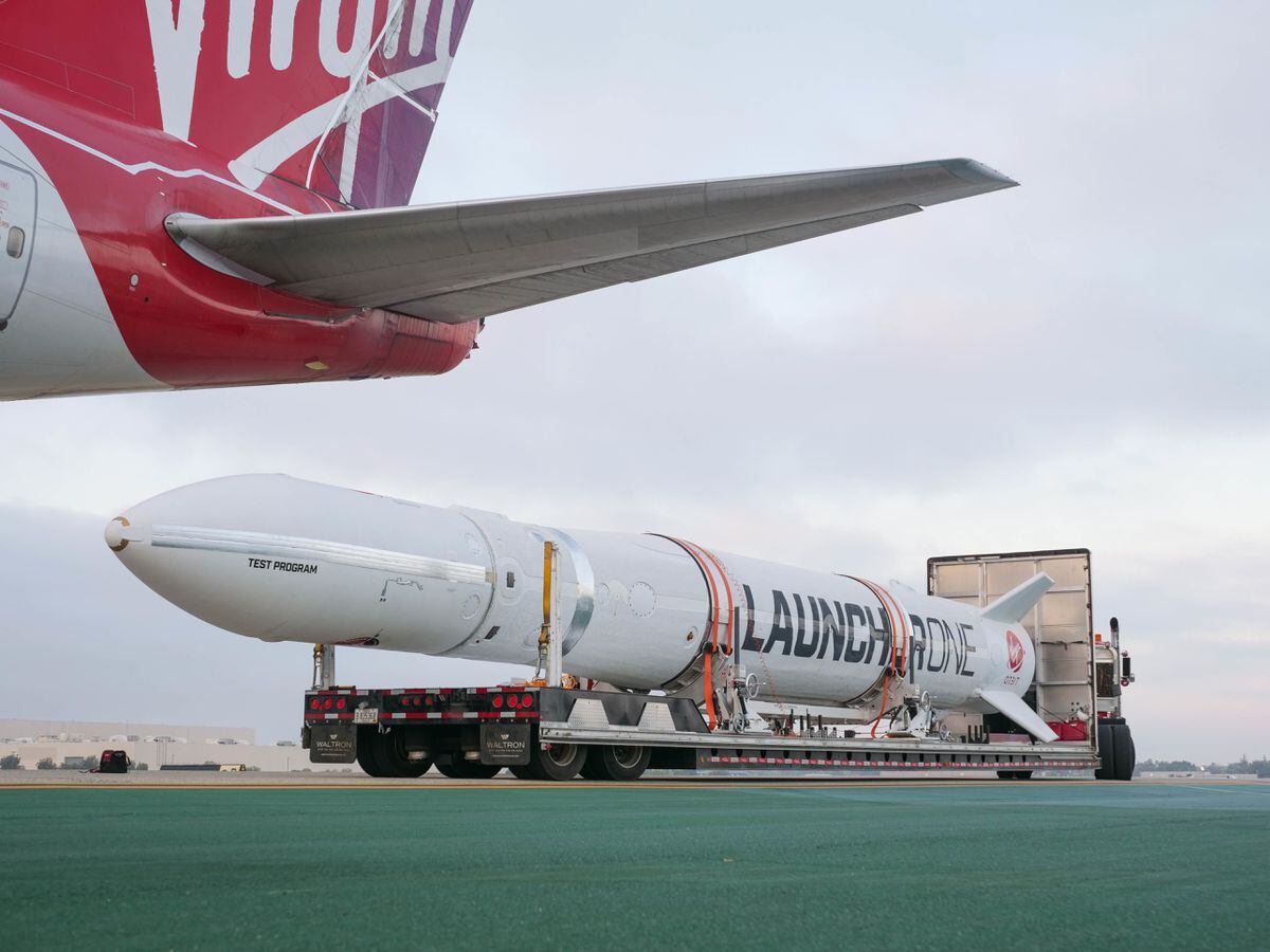 Virgin Orbit's LauncherOne rocket approaching a repurposed Boeing 747 aircraft from which it will be launched