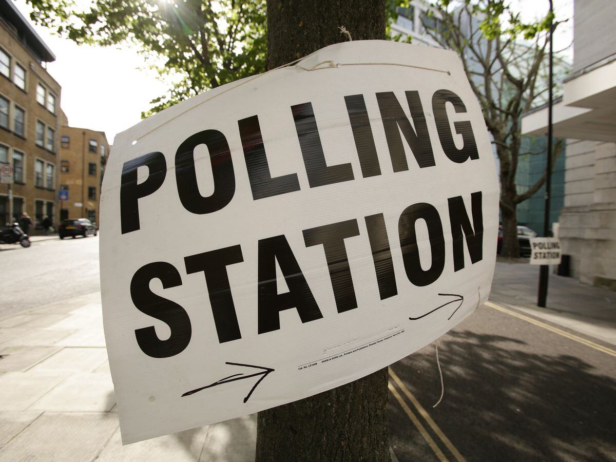 A polling station sign in Hackney in east London (Yui Mok/PA)