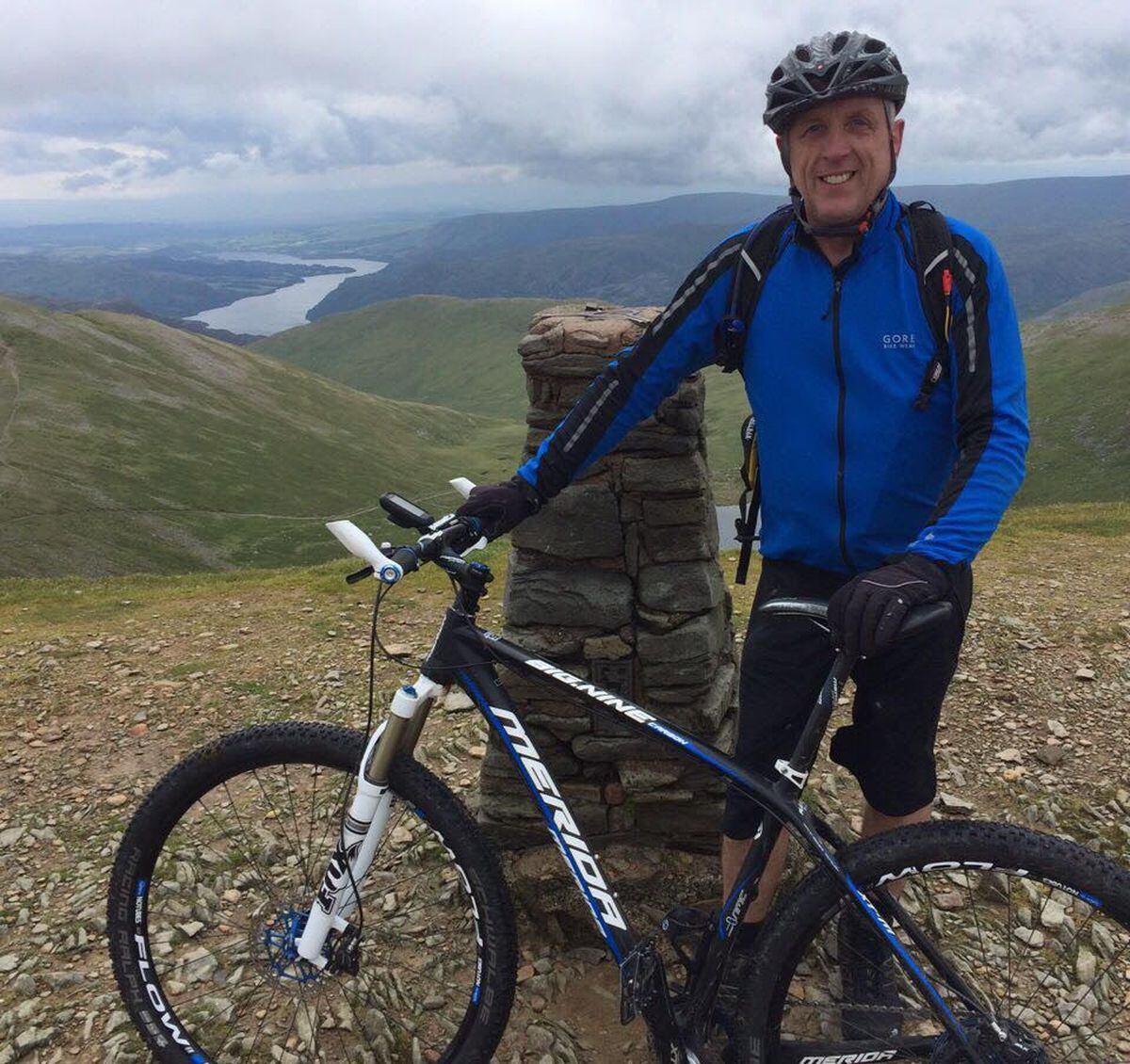 Chris Evans at the top of Helvellyn in the Lake District.